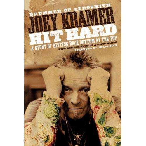 Joey Kramer signs his new memoir.