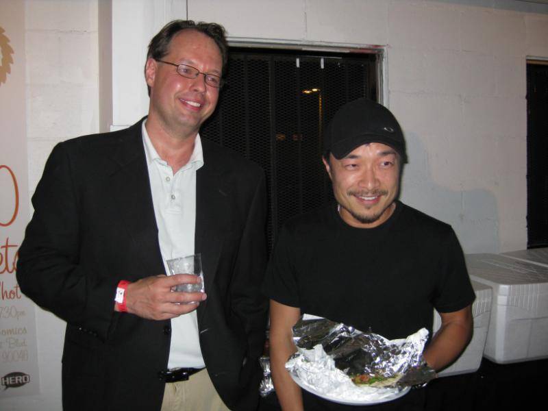 Jim Lee stops by and takes a photo with Jim McLaughlin.