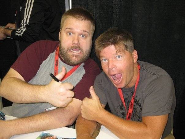 Robert Kirkman and Robert Liefeld goofing around at the Image booth.