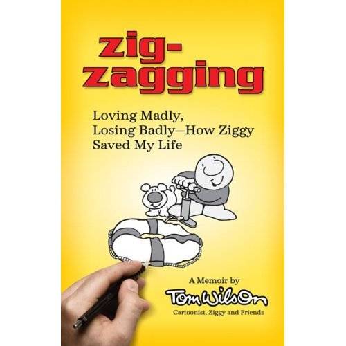 Tom Wilson signs at Joseph-Beth Booksellers on August 4th.