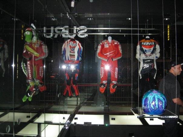 Motorcycle suits on display.