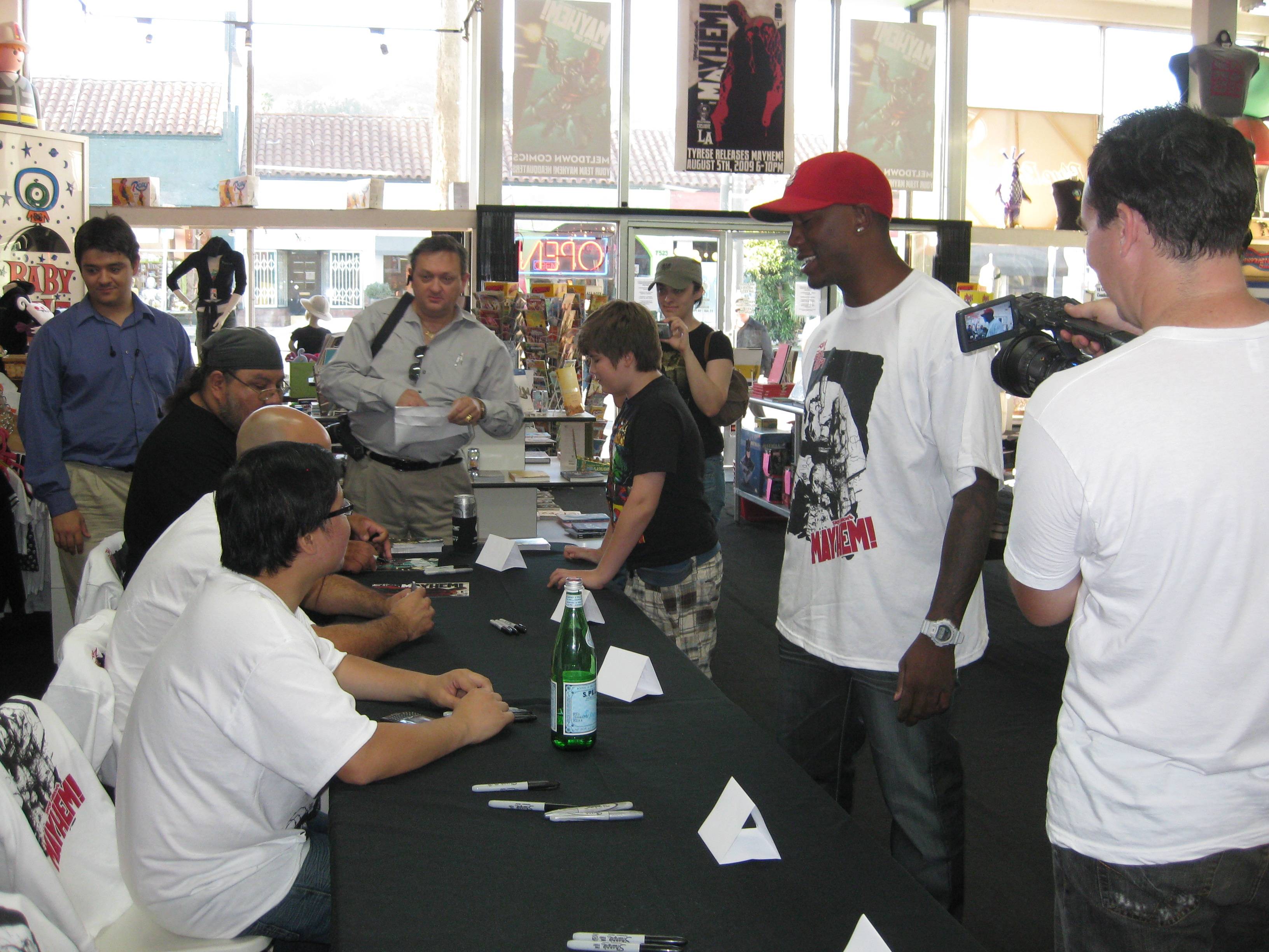 Tyrese greets his Mayhem crew as onlookers gawk on.