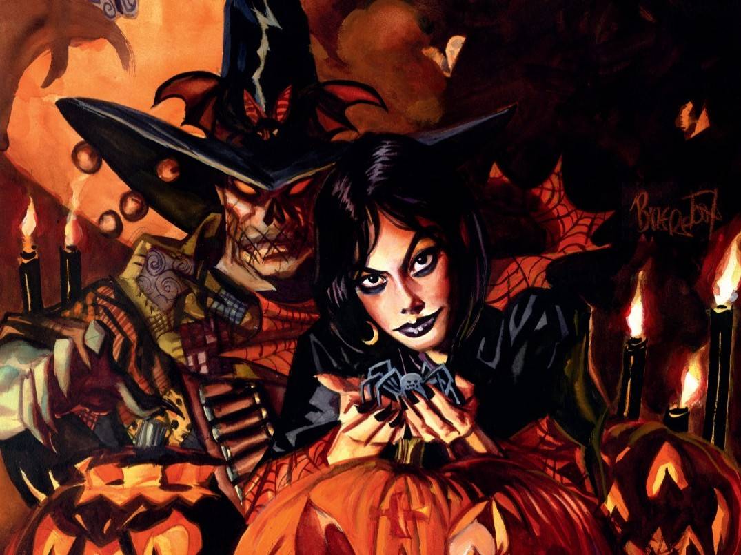 A woman dressed in black holds a spider in front of carved pumpkins and candles, with a sinister scarecrow figure in a witch hat looming behind her.