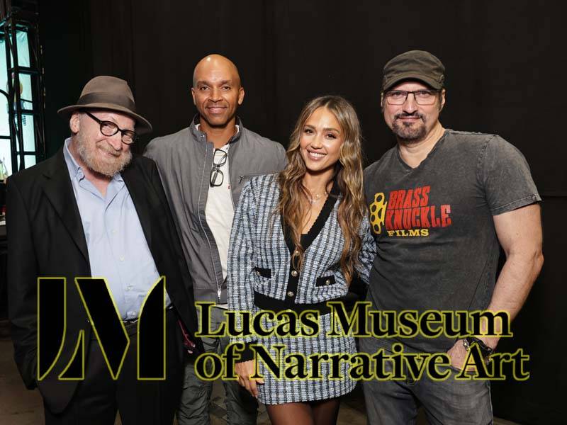 Four people stand together smiling at an event, with a Lucas Museum of Narrative Art logo overlaid in the foreground.