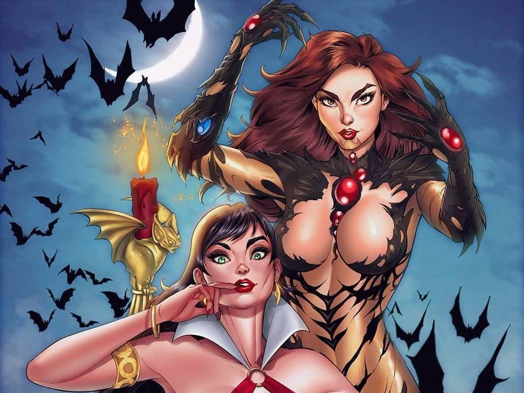 Two women in fantasy costumes pose under a full moon, surrounded by flying bats; one holds a candle with a dragon holder, the other has long hair and a black, tattered outfit with red gems.